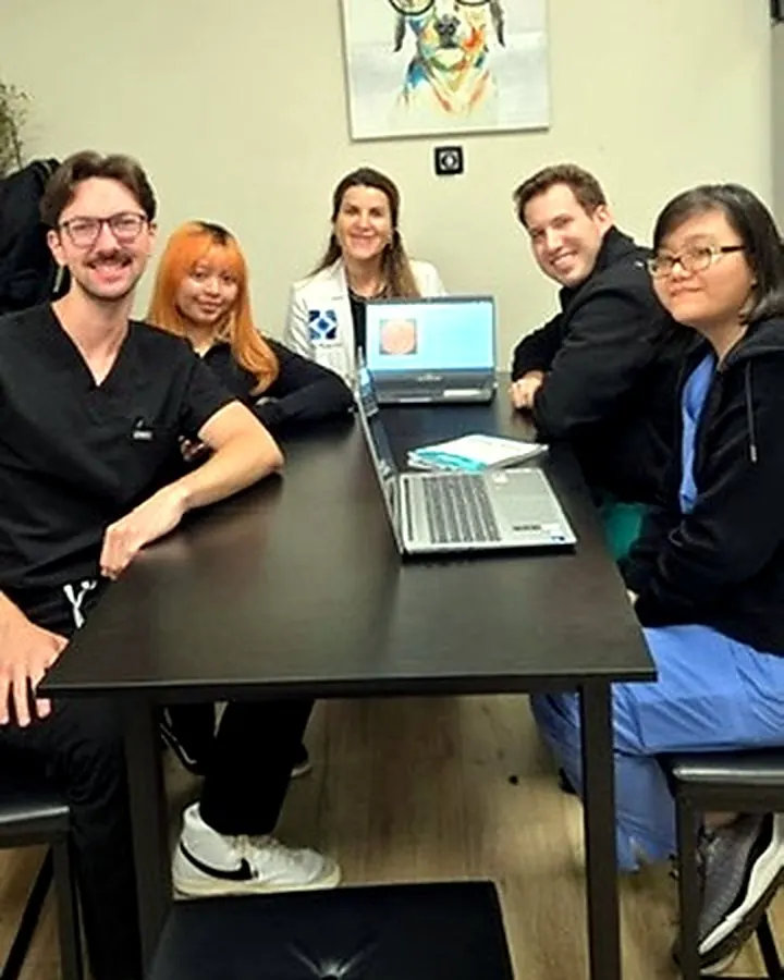 Hashemi Eye Care team members gathered for clinical learning and case discussion